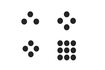 Patterns in black and white featuring circles arranged in various geometric formations indoors