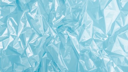Overhead perspective of light blue plastic wrapping film as a background