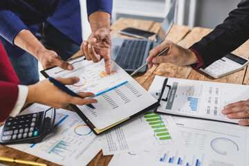 Business people working together, analyzing financial documents. Financial advisor and auditor are...