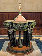 Paris, France-April 16, 2025: Decorated Baptismal Font In Notre-Dame