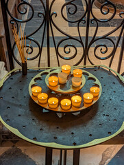 Paris, France-April 16, 2025: Small Candle Offering Table