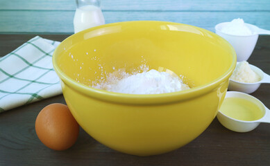 Ingredients ready for baking Brazilian cheese bread or Pao de Queijo on kitchen Table