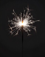 Obraz premium Sparkling Celebration Bright Festive Sparkler on Black Background.