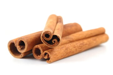 Warm, aromatic cinnamon sticks arranged beautifully, evoking cozy culinary moments and natural spice essence for baking and cooking inspiration