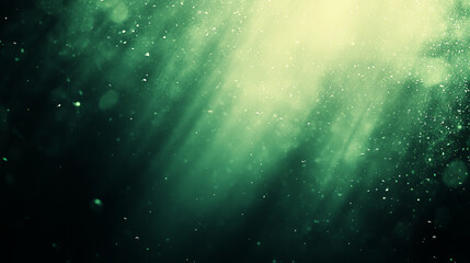 Abstract green ethereal background with soft light and particles