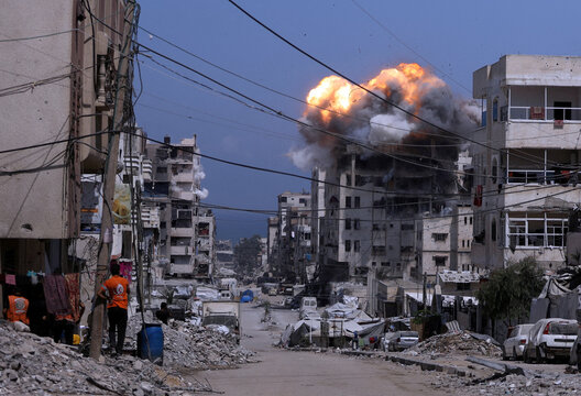 Aftermath Of A Strike In Gaza City Showing Destruction And Smoke