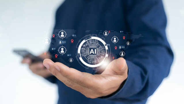 A businessman using AI technology to manage global human data, showing an artificial intelligence interface and digital network for business and recruitment strategy.
