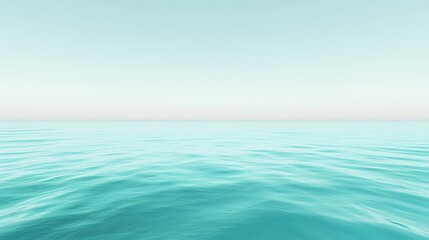 Obraz premium Calm turquoise ocean water background with soft horizon and gentle waves, perfect for travel ads