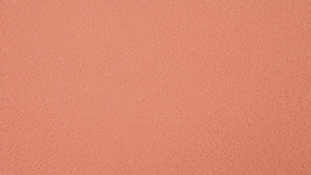 Decorative background featuring peach fuzz toned grunge texture with stylized art elements