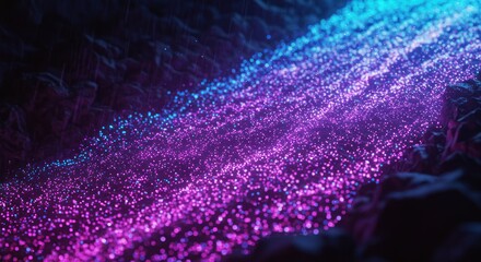 Stream of glowing blue  purple particles winding through rocky terrain