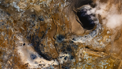Explore an enchanting Hverir geothermal landscape in Iceland, where vibrant mineral deposits...