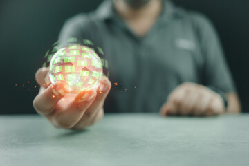 Net zero concept. Man hand holding globe green energy icon represents. Learning for data analysis management for carbon and Net zero emission.