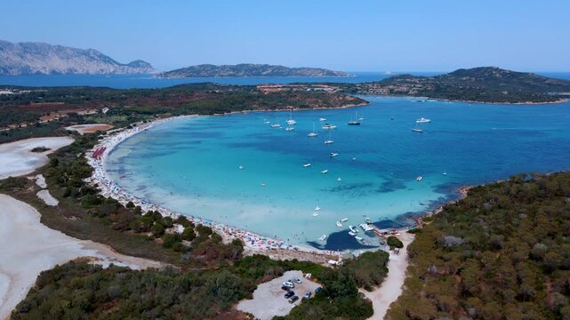 Reverse Aerial Drone Flyaway from Cala Brandinchi, Sardinia &ndash; Stunning Coastal Landscape