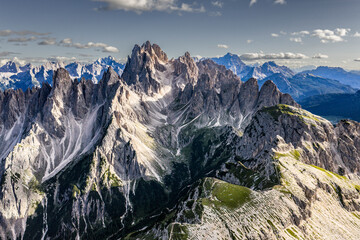 Sharp jagged peaks of Cadini di Misurina seen from above — Dolomites, Italy, summer aerial...