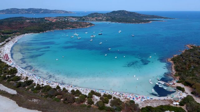 Forward Drone Flyover of Cala Brandinchi, Sardinia &ndash; Crystal Clear Water and Beach