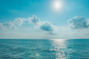 Bright Sun Over Blue Ocean Waves water