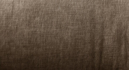 Brown fabric texture background with subtle sheen. Elegant textile surface for design, fashion, upholstery, or abstract backdrop. High-quality natural fibers. close up fabric texture.