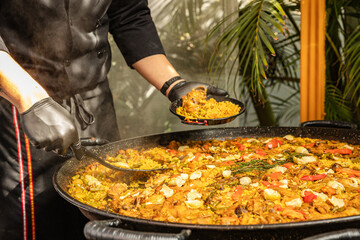 Preparing a delicious seafood paella