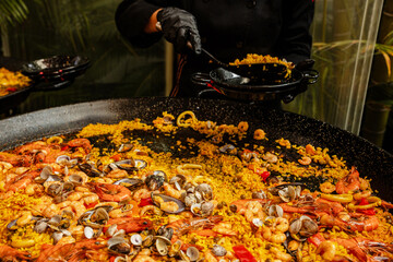 Preparing a delicious seafood paella