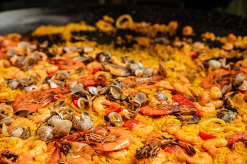 Preparing a delicious seafood paella