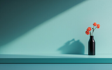 Turquoise wall shelf black vase orange flowers sunlit aquamarine blue green