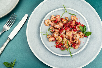 Fried aromatic shrimps.