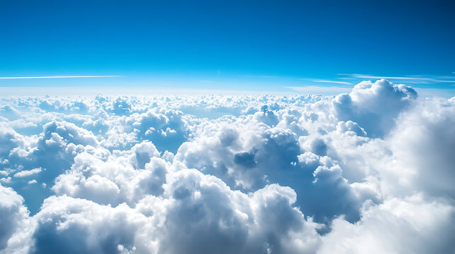  A view from a plane flying above a thick layer of clouds 