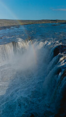 Witness the breathtaking beauty of Selfoss waterfall as it thunders down rocky cliffs into a...
