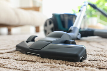 One vacuum cleaner on floor indoors, closeup