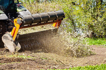 Forestry mulching cutter head for excavator to mulching vegetation of road side.