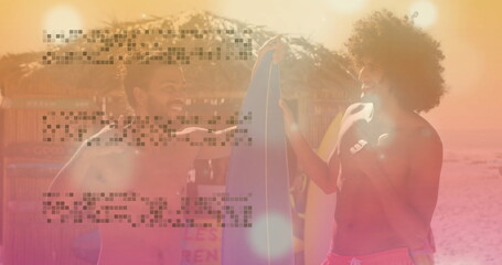 Holding blue surfboard, two shirtless men smiling and lifting at beach, with thatched-roof hut