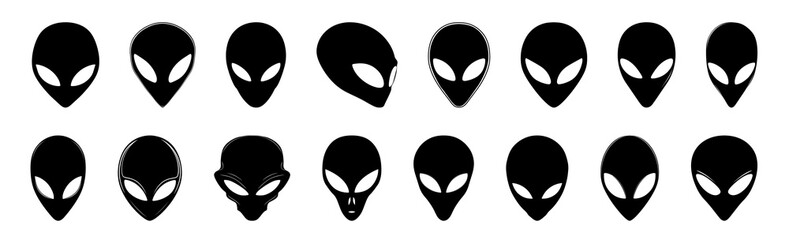 Silhouette of black alien heads with smooth, elongated skulls and large oval eyes