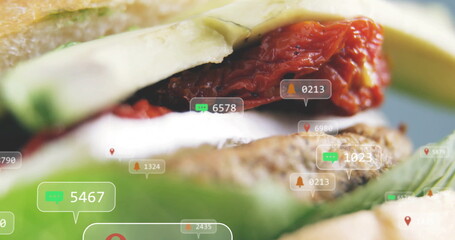 Showing sandwich with lettuce, sundried tomatoes, avocado on counter, with notification icons