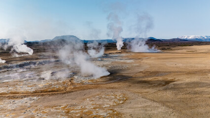 Explore the captivating geothermal area in Hverir Iceland, where steam rises from the earth, revealing the raw power of nature.