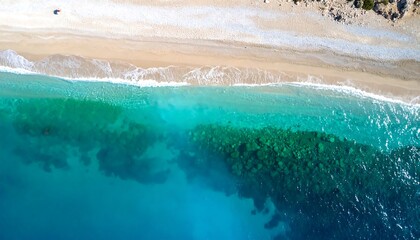 Beach and turquoise water aerial view