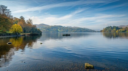 Obraz premium Windermere Lake in the UK: Lake District Beauty, Scenic Shores, and Serene Waters in Cumbria's Natural Landscape