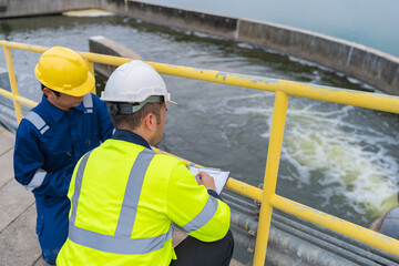 Environmental engineers work at wastewater treatment plants,Water supply engineering working at...