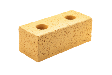 a brick with holes in it on a white background