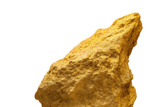 a large rock with a small piece of gold on top