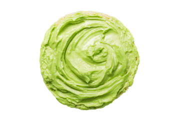 a green frosted cookie with a white background