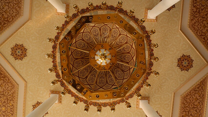 Ornate Gold Chandelier On Ornate Ceiling