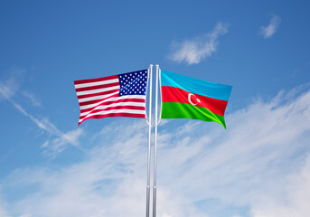 flags of  azerbaijan and United States of America over blue sky background.
