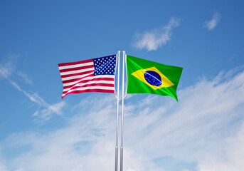 flags of  brazil and United States of America over blue sky background.