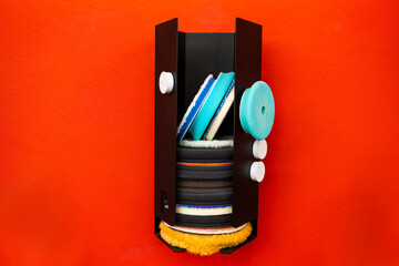 Polishing pads arranged in holder. Auto detailing foam and microfiber pads. Organized polishing...