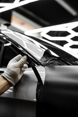 Full Panel Car Vinyl Wrapping. Large-scale vinyl wrap installation transforms the vehicle exterior...