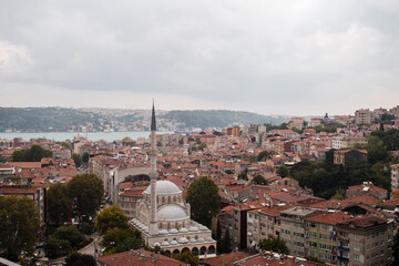 A cityscape view over the Bosporus of the suburbs in the city of Istanbul, Turkey.