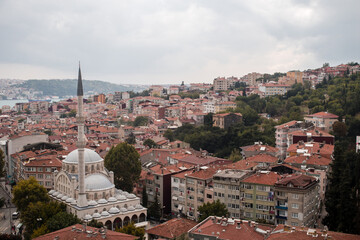 Fototapeta premium A cityscape view over the Bosporus of the suburbs in the city of Istanbul, Turkey.