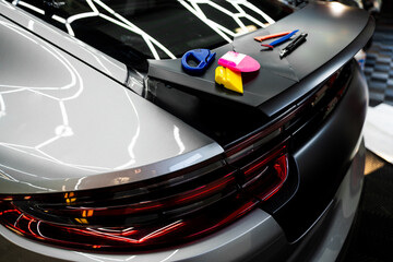 Vinyl wrapping tools and colorful applicators. Blades, scrapers, and squeegees enable smooth and...
