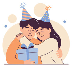 Joyful couple celebrating a special occasion with a gift and party hats embracing warmly