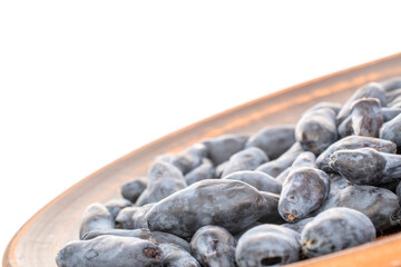 Sweet honeysuckle berries isolated on white background, top view.